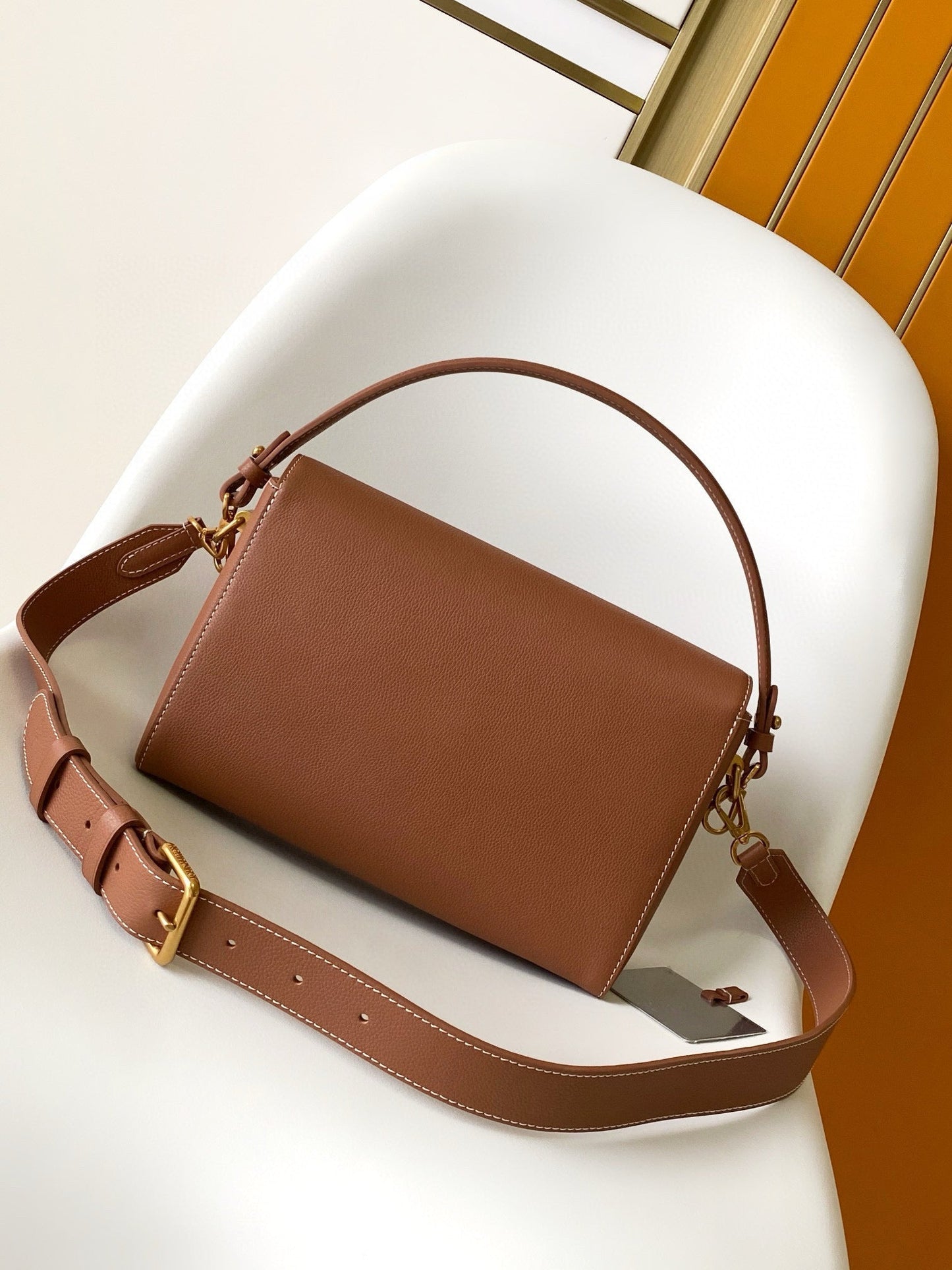 SOFT TWIST 27 IN COGNAC CALFSKIN GOLD LOGO