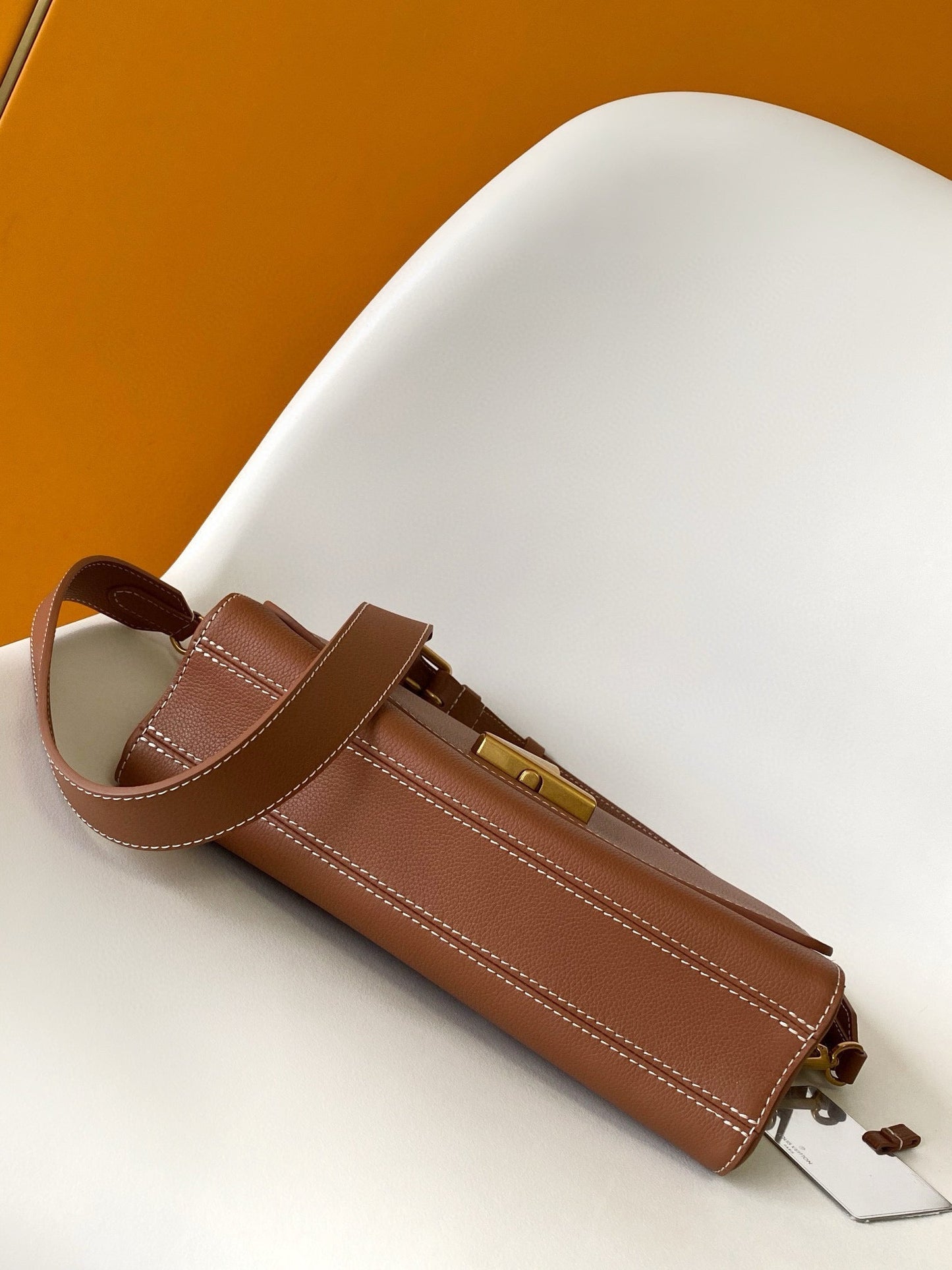 SOFT TWIST 27 IN COGNAC CALFSKIN GOLD LOGO