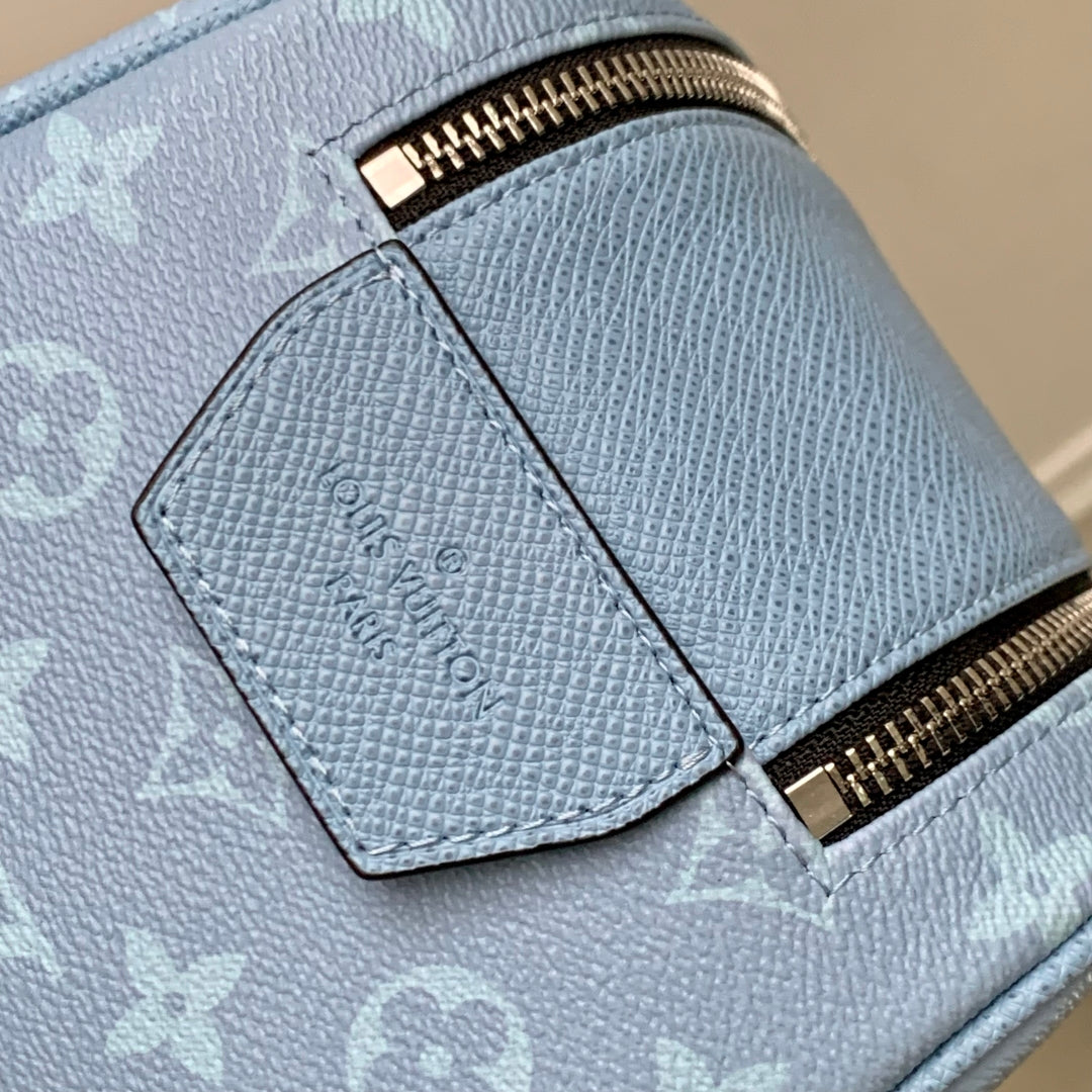 DOPP KIT 28 IN BLUE MONOGRAM COATED CANVAS