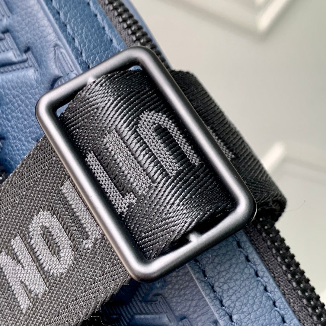 TRIO MESSENGER 25 IN BLUE MONOGRAM SHADOW CALFSKIN