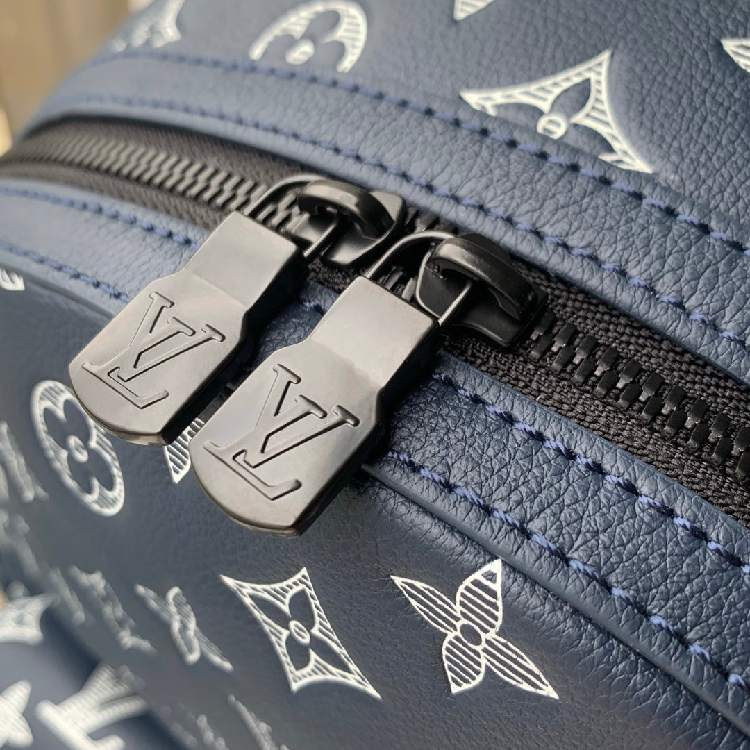 DISCOVERY PM BACKPACK 38 IN NAVY BLUE LAMBSKIN WHITE MONOGRAM LOGO