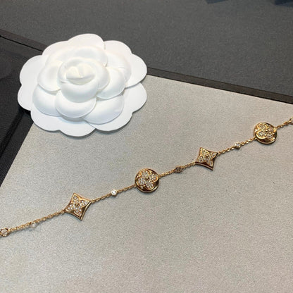 [AURORA]STAR AND SUN 4 MOTIFS GOLD DIAMONDS BRACELET