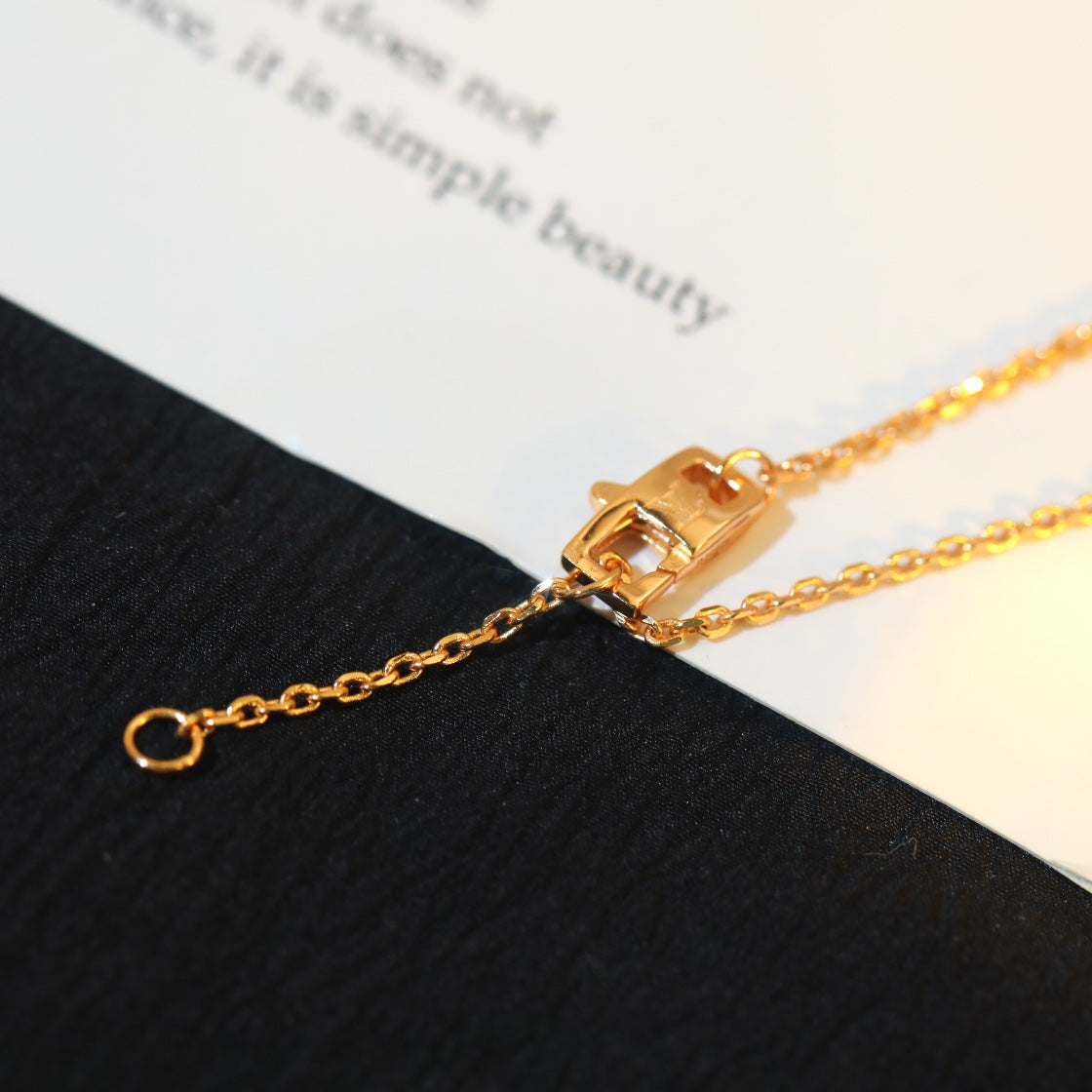 [AURORA]HALSKETTE AUS ROTGOLD MIT STERN UND SONNE