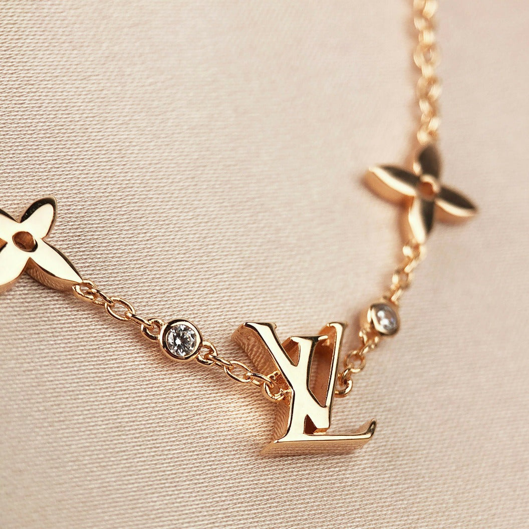 [AURORA]STAR AND SUN 7 MOTIFS GOLD BRACELET