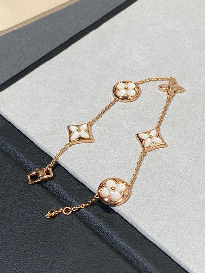[AURORA]STAR AND SUN 5 MOTIF MOP PINK GOLD BRACELET
