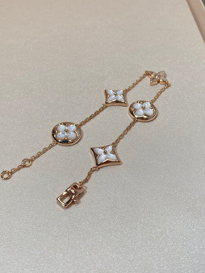 [AURORA]STAR AND SUN 5 MOTIF MOP PINK GOLD BRACELET