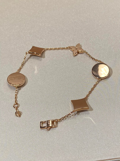 [AURORA]STAR AND SUN 5 MOTIF MOP PINK GOLD BRACELET