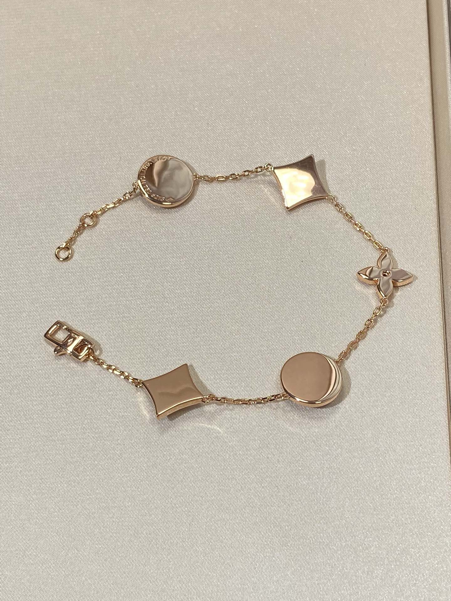 [AURORA]STAR AND SUN 5 MOTIF MOP PINK GOLD BRACELET