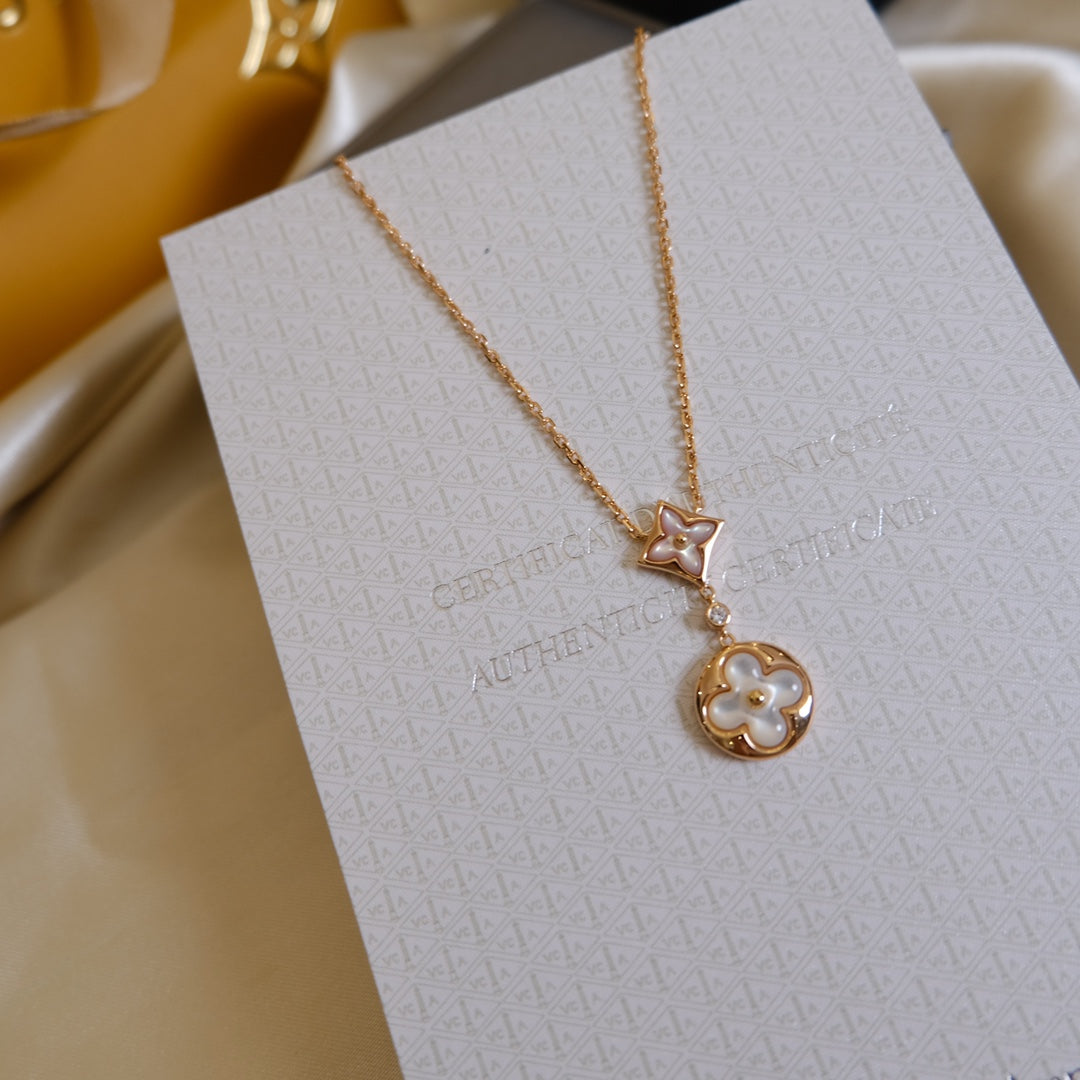 [AURORA] HALSKETTE MIT STERN UND SONNE, WEISSEM MOP 2-MOTIV, ROSA GOLD 