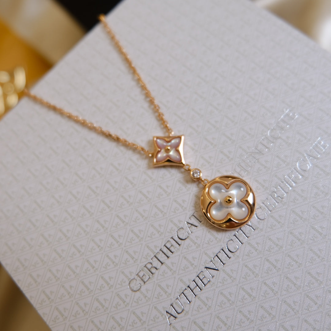 [AURORA] HALSKETTE MIT STERN UND SONNE, WEISSEM MOP 2-MOTIV, ROSA GOLD 