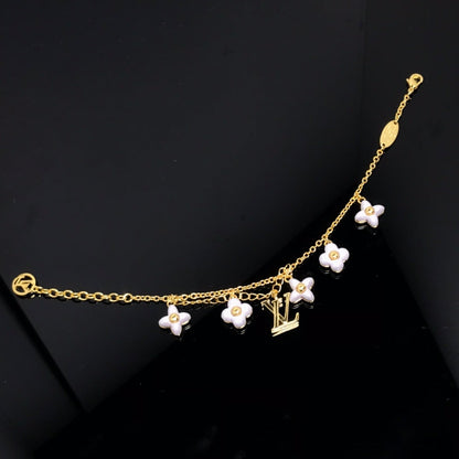 [AURORA]LOGO 6 MOTIF STAR AND SUN GOLD BRACELET