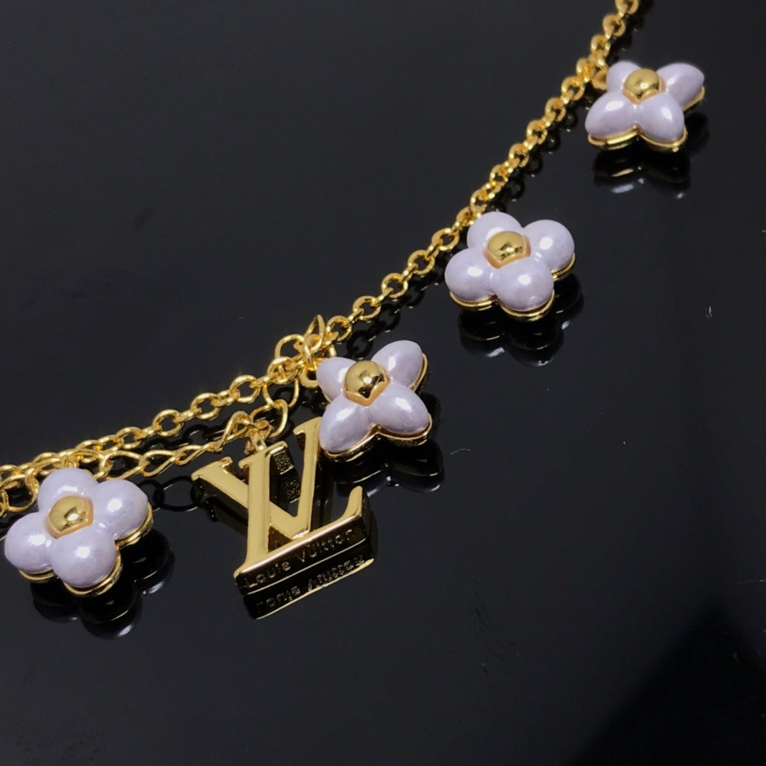 [AURORA]LOGO 6 MOTIF STAR AND SUN GOLD BRACELET