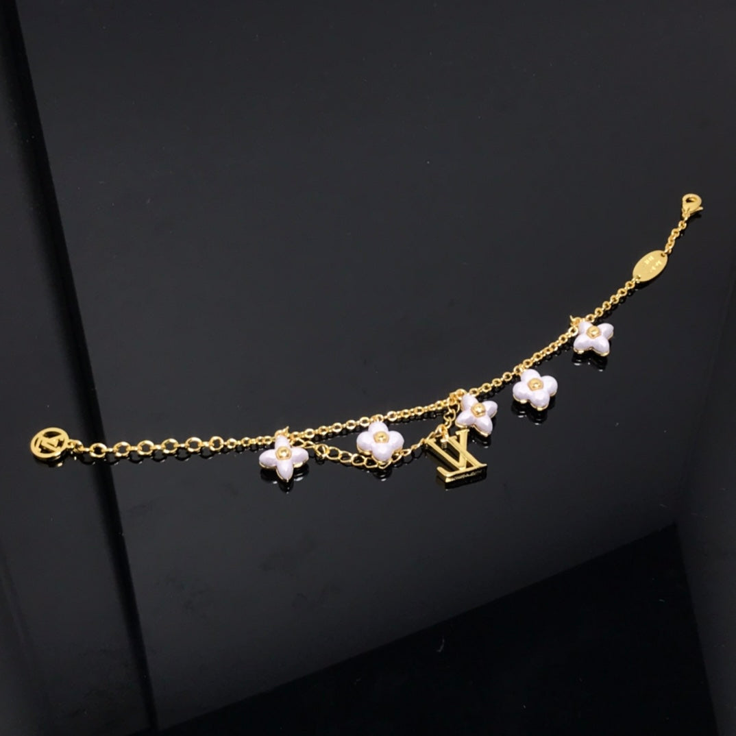 [AURORA]LOGO 6 MOTIF STAR AND SUN GOLD BRACELET