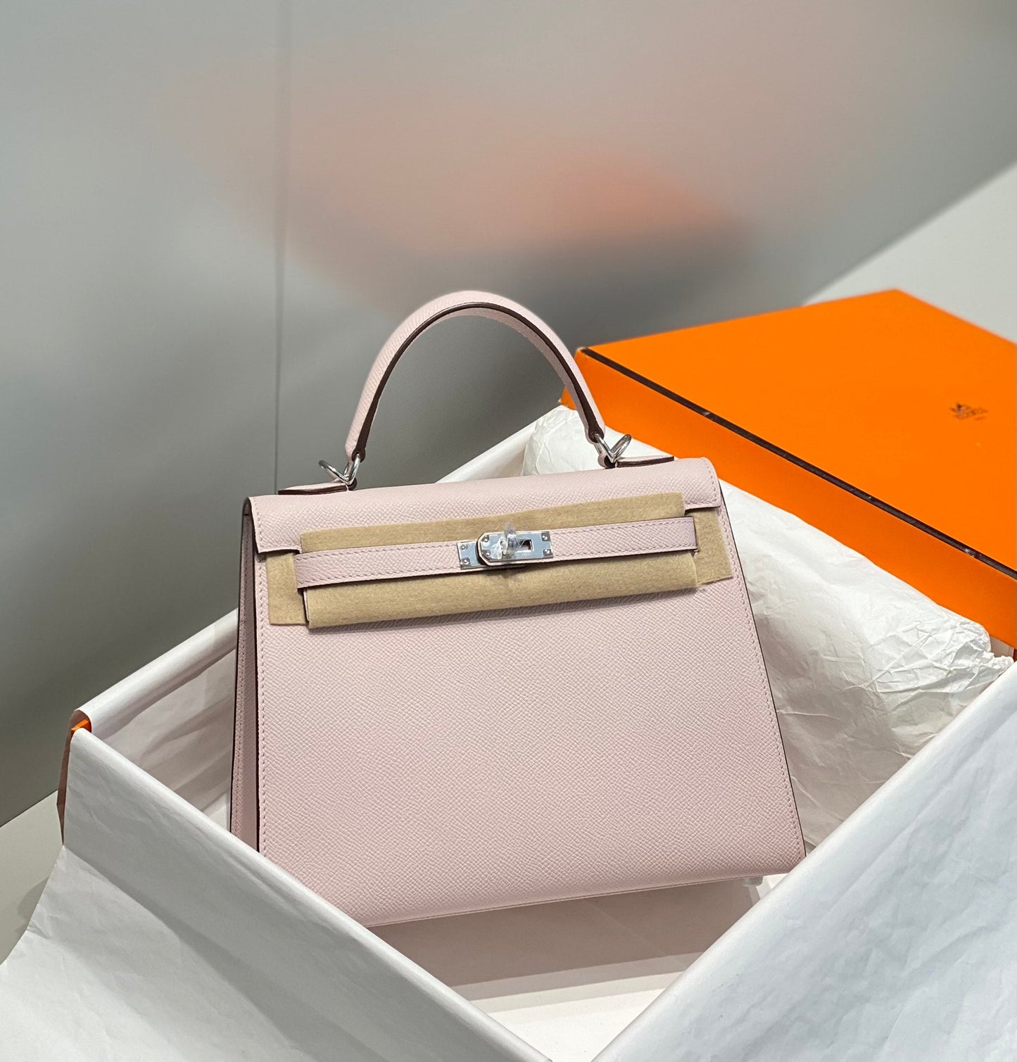 KELLY 25CM IN EPSOM MAUVE SWIFT CALFSKIN SILVER HARDWARE