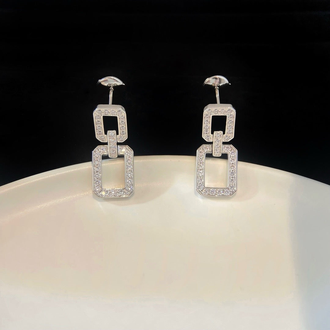 [AURORA]MITTLERE LINKS-OHRRINGE MIT DIAMANT