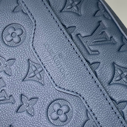 TRIO MESSENGER 25 IN BLUE MONOGRAM SHADOW CALFSKIN