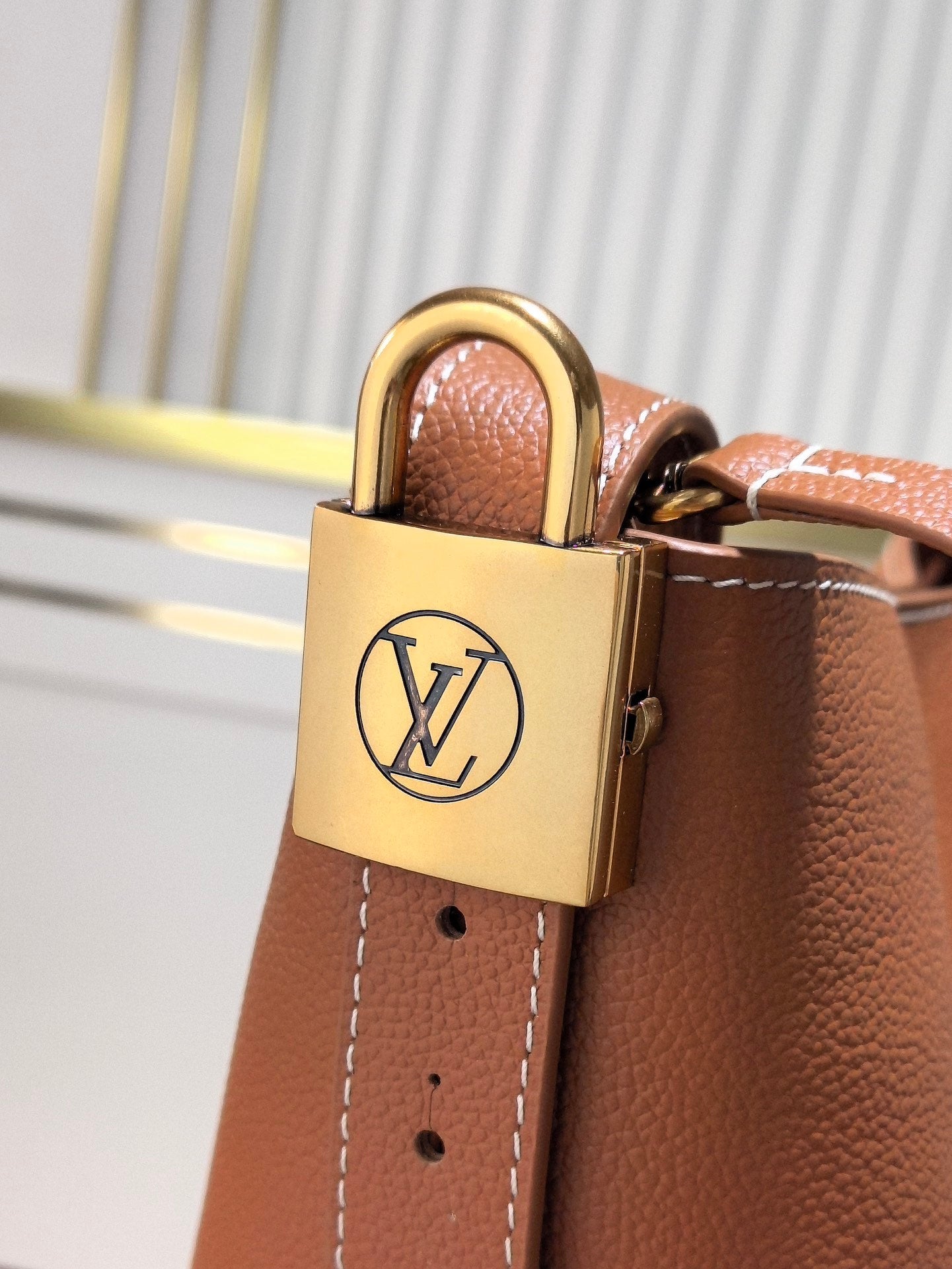LV 25S LOW KEY ALL IN BB 18 IN BURNT SIENNA CALFSKIN GOLD HARDWARE