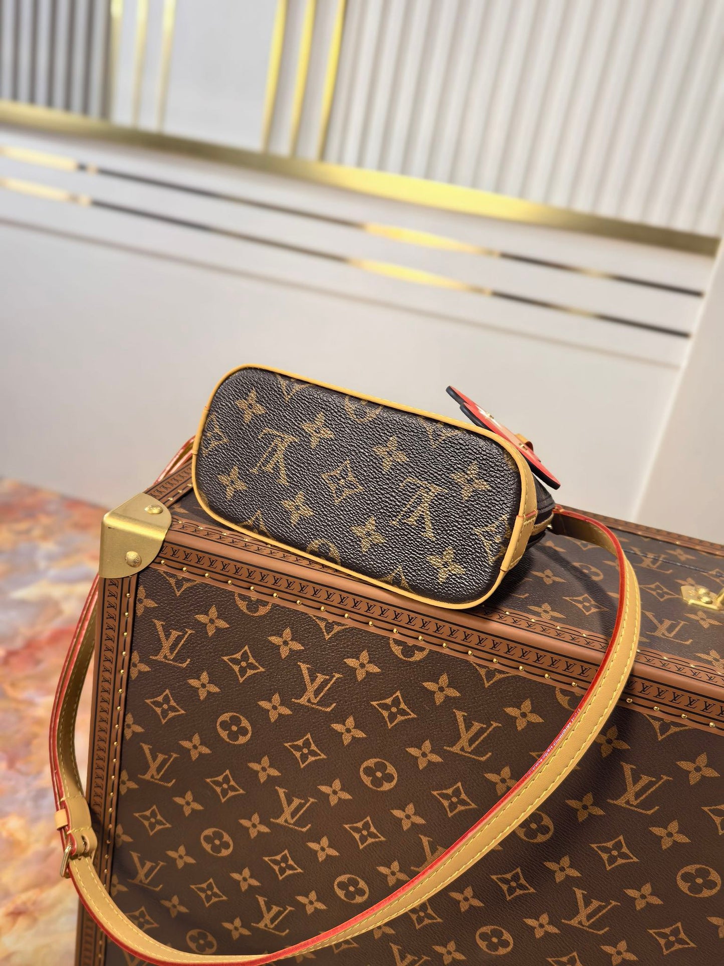 LV 25S NANO ALMA 18 IN BROWN MONOGRAM CANVAS PRINTED WITH THE VIVIENNE MASCOT