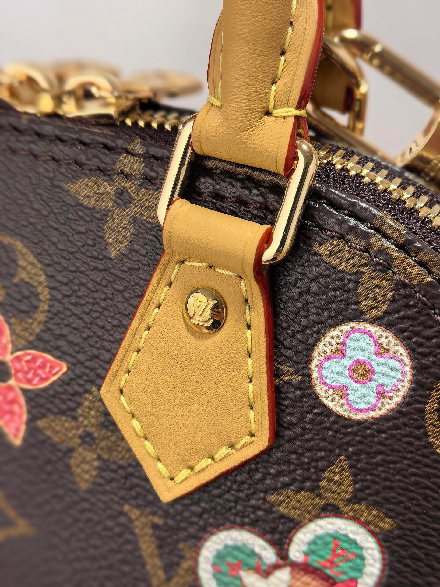LV 25S NANO ALMA 18 IN BROWN MONOGRAM CANVAS PRINTED WITH THE VIVIENNE MASCOT