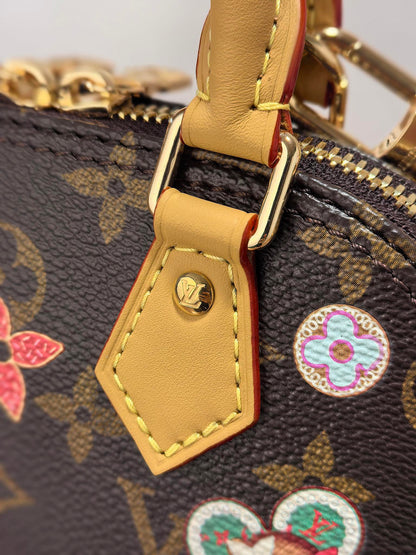 LV 25S NANO ALMA 18 IN BROWN MONOGRAM CANVAS PRINTED WITH THE VIVIENNE MASCOT