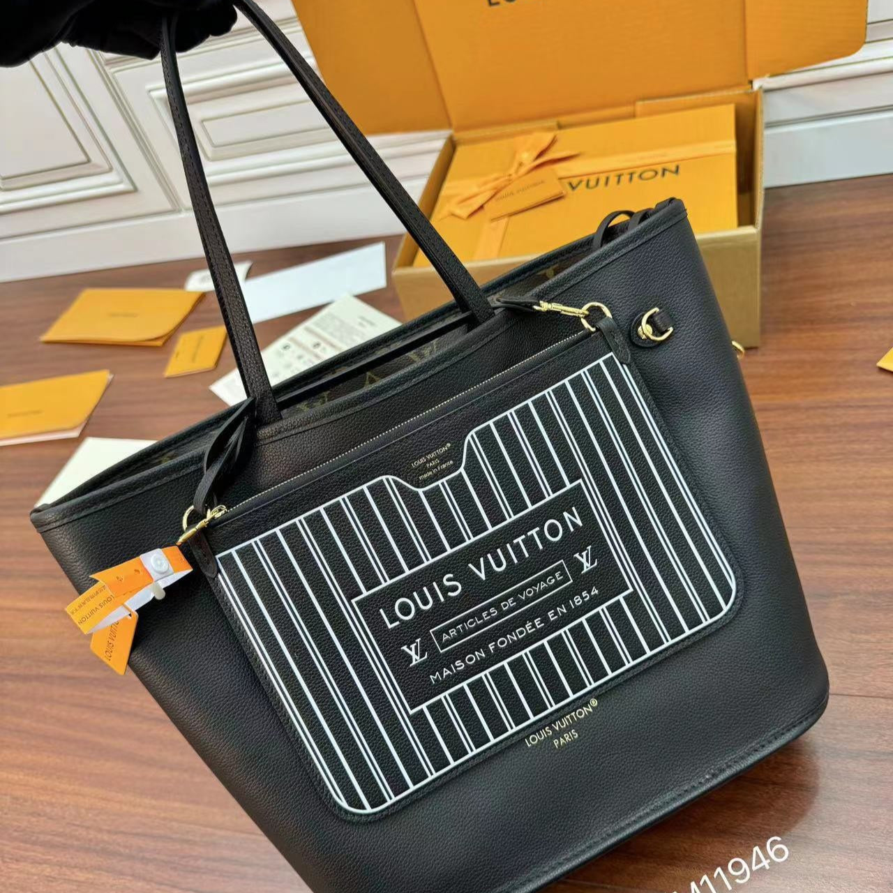 NEVERFULL INSIDE OUT MM BAG 31 IN BROWN MONOGRAM COATED CANVAS AND CALFSKIN