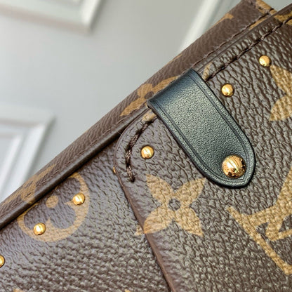 TRUNKIE 27 IN BROWN COATED CANVAS BLACK CALFSKIN SIGNATURE S-LOCK