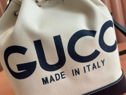 DRAWSTRING SHOULDER BAG LOGO PRINT 31 IN WHITE CANVAS DARK BLUE CALFSKIN